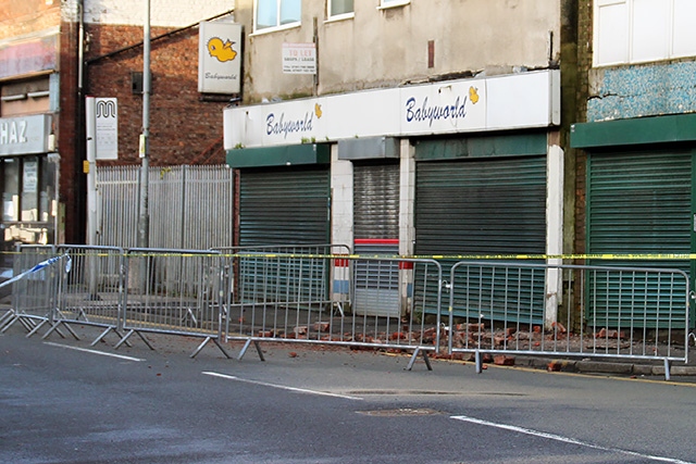 A wall of the former Baby World store in Middleton has partly collapsed due to damage from the wind