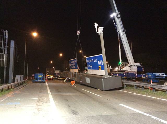 Overhead gantry being removed on the M60 earlier in the year