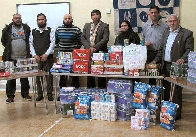 Deeplish Community Centre and KYP staff members, volunteers and residents and councillors launching the Cumbria relief Aid