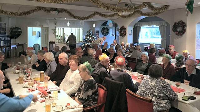 Pensioners enjoying Christmas lunch at Norden Cricket Club