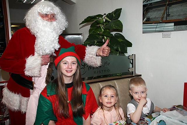 Ella Jaye Garner and Elliot Carl Hayes with Santa and his Elf