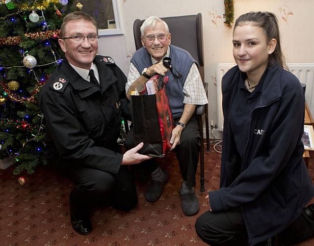 Chief Constable Ian Hopkins and a local police cadet with local residents