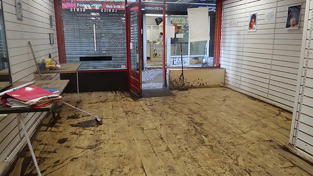 A shop in The Walk after the flood