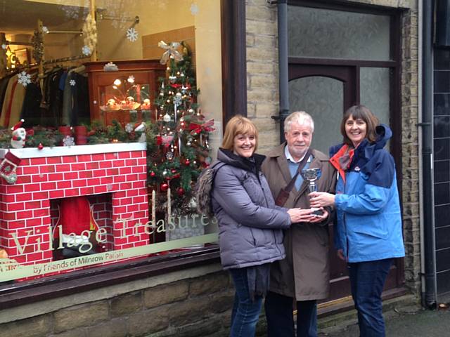 Village Treasures winner of Milnrow's Small Business Saturday window dressing competition with Cllr Allen Brett and Pennines Township Officer, Tracey Knight