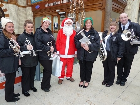 Santa with Littleborough Band at Victoria Station