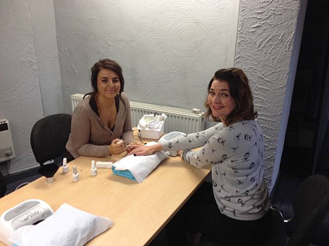 Beautician Sarah Maggs and Sara Burns in the make-shift nail bar in Simon Danczuk’s constituency office