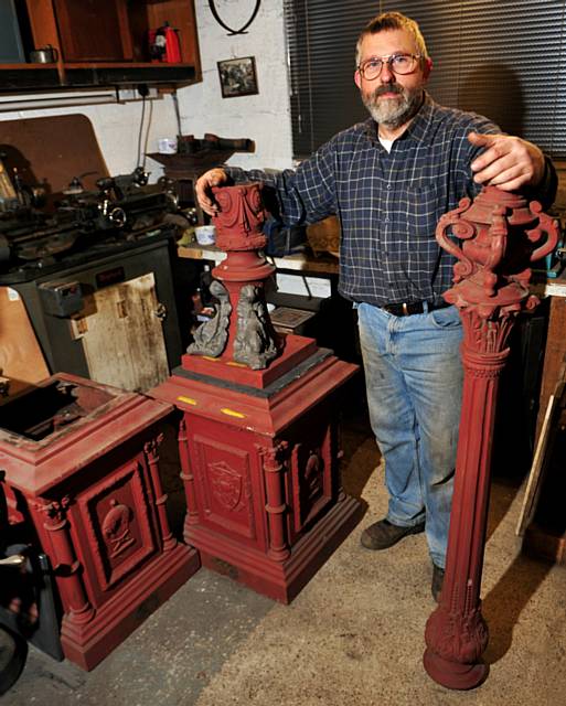 Cast Iron craftsman John Wade with the Mayoral Lamps that he is restoring for the Friends of Rochdale Town Hall