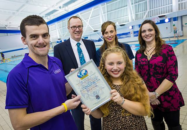 Rebecca Hayley with her parents receiving the Roll of Honour award from STA’s Zoe Cooper and Matt Di Rosa, her swimming and lifesaving teacher at Link4Life