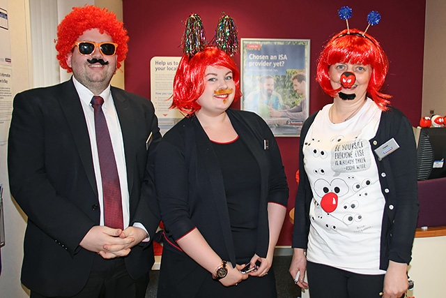 Nationwide Building Society staff make their faces funny for money for Red Nose Day