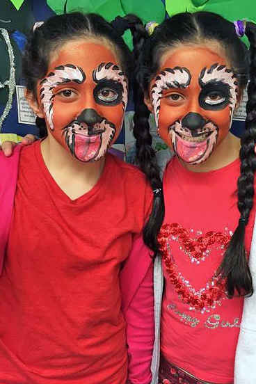 Broadfield Community Primary School pupils making their faces funny for money for Red Nose Day