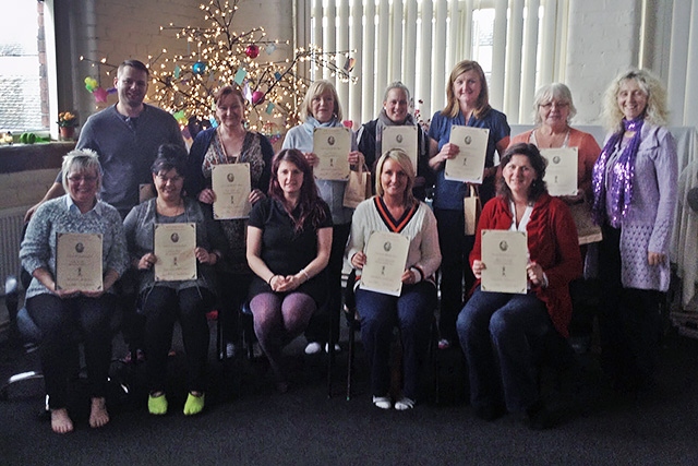 Jo Potts with her team of Reiki Masters and staff and volunteers from Springhill Hospice at True Serenity Centre for Holistic Excellence