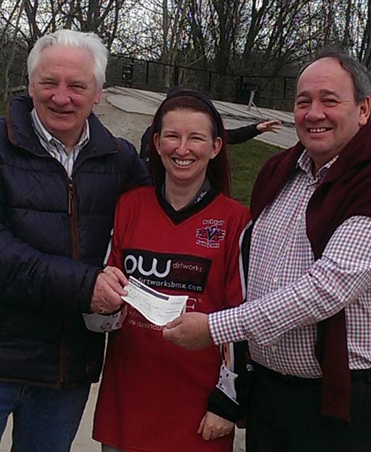 President Edwin Partridge and 2nd Vice President Paul Towriss handing over a cheque for £500 to Yvonne Mills of Roach Valley  BMX Club