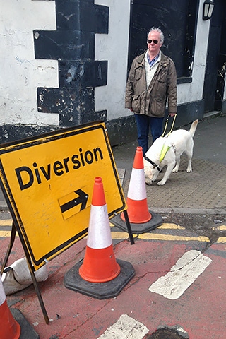 Castleton resident Frank Salt and his guide dog Lewis<br /> highlight one of the challenges faced by blind<br /> and partially sighted people