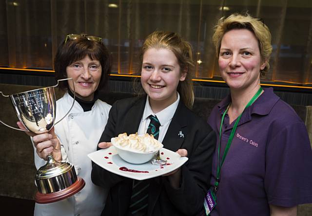 Judges Hopwood Hall College lecturer Julie Jones (left) and Natasha Brown (right) with junior master baker winner Eleanor Smethurst (centre)