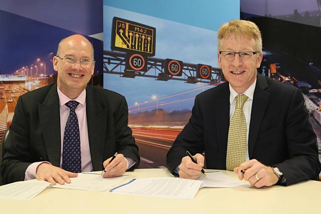 Jon Lamonte (left) and Graham Dalton (right) signing the 'Memorandum of Understanding' in London yesterday