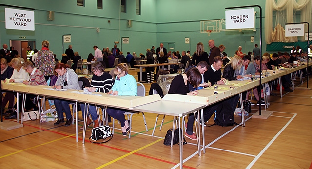 Ballot papers being checked at Heywood Sports Village