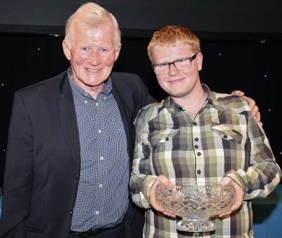 John Durcan, from the Emerson Educational Trust presenting the Emerson Trust rose bowl to Thomas Bradshaw