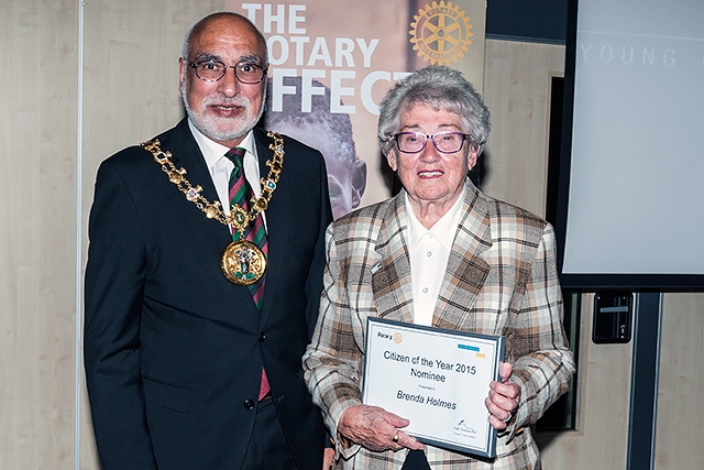 Mayor of Rochdale Surinder Biant presents a certificate to  Brenda Holmes