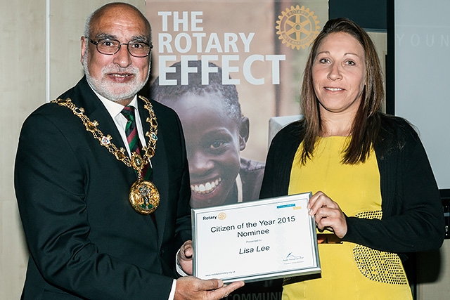 Mayor of Rochdale Surinder Biant presents a certificate to Lisa Lee