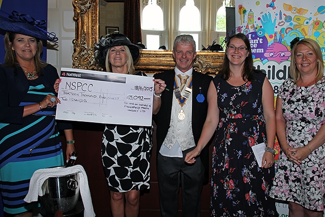 Ascot at Nutters<br />Nicki McGill and Liz Jackson from Fisherfield Farm Nursery present a cheque to Debbie Sefton and Helen Matthews from the NSPCC