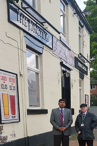 Councillor Aasim Rashid and Councillor Billy Sheerin <br />outside the 'abandoned' Junction pub which has been empty for over two years