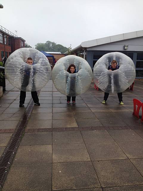 Visitors taking part in bubble football at Hopwood Hall College’s Summer Fun Day