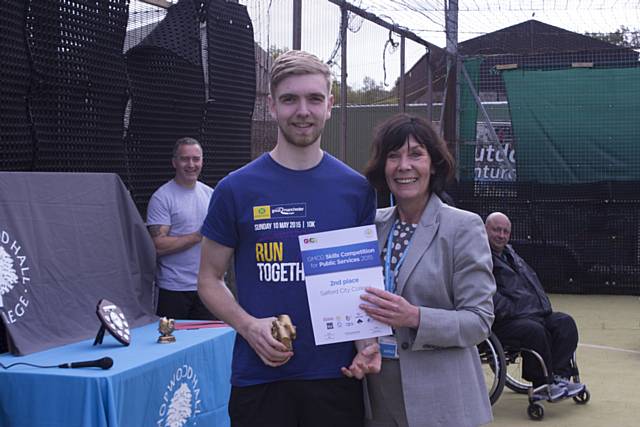 Dean Mellor, being presented by Lesley Hawkins, Assistant Principal of Hopwood Hall College for the second place win