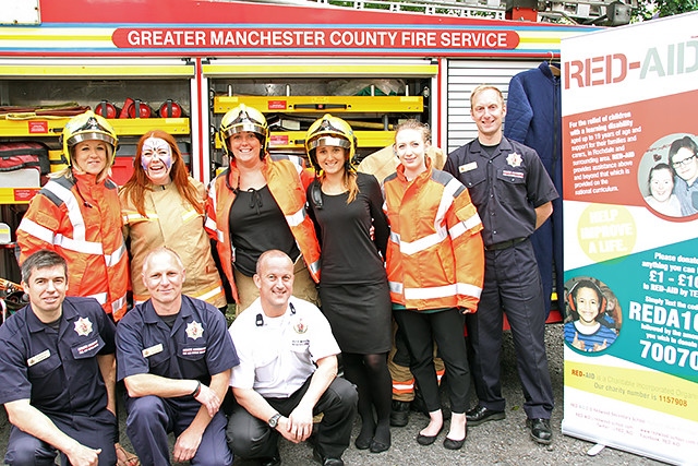 The Crimble charity fun day for Red-Aid<br />Staff from The Crimble with fire fighters from Heywood Blue Watch