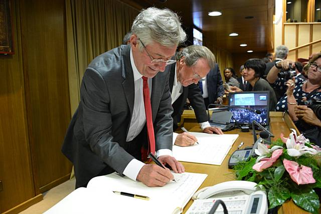 Tony Lloyd signing the declaration