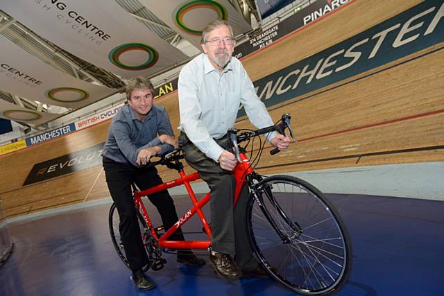 Cllr Andrew Fender, Chair of the TfGM Committee, and Ian Drake, British Cycling CEO, launch the Greater Manchester Cycling Partnership in tandem