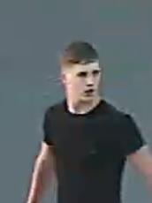 CCTV still of a man they wish to speak to in connection with the attack 