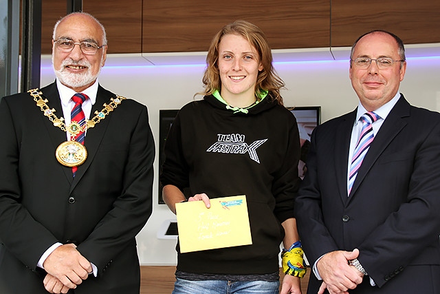 Rochdale Half Marathon third place female runner Hannah Oldroyd collects her prize