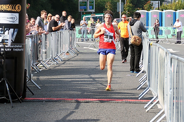 Joe Bailey approaches the finish line to win the Rochdale 10k run