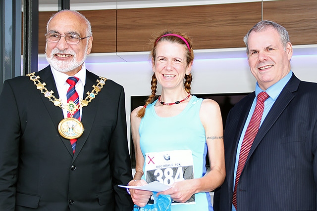 Rochdale 10k run fifth place female runner Alison Reid collects her prize