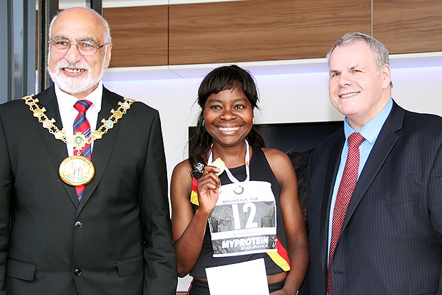 Rochdale 10k run fourth place female runner Josefa Terim collects her prize