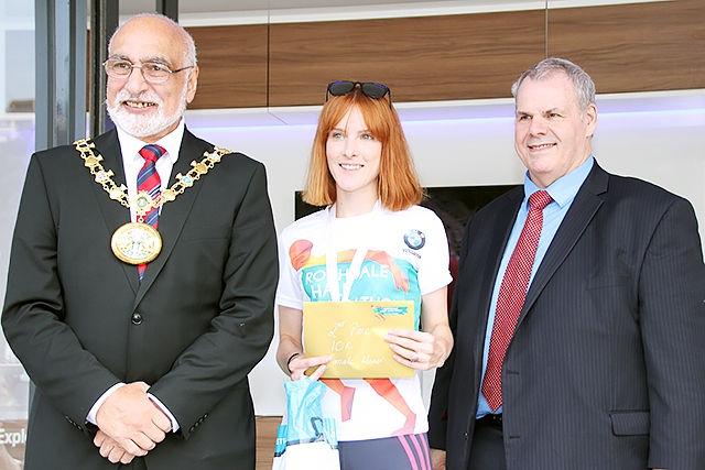 Rochdale 10k run second place female runner Sarah Carroll collects her prize