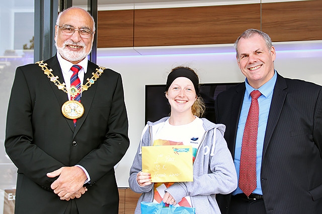 Rochdale 10k run first place female runner Kirsty Johnson collects her prize