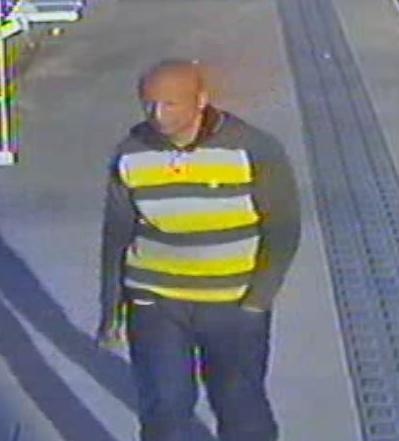 Image of a man police would like to speak to after a woman was harassed on the Metrolink