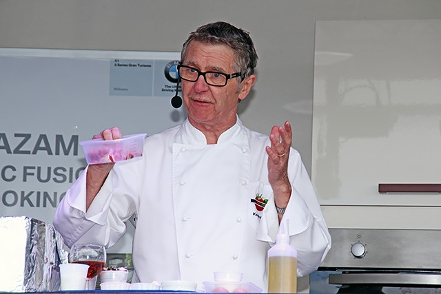 Kevin Woodford cooking in the Feel Good Festival celebrity food kitchen