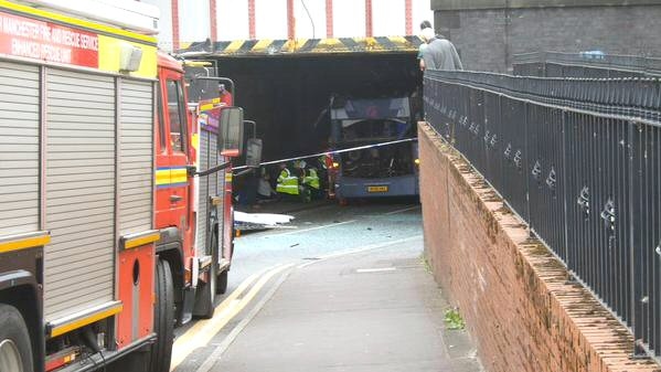 Double decker bus collided with the Milkstone Road railway bridge