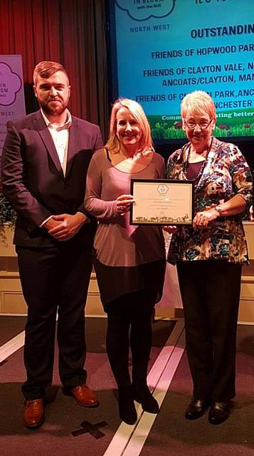 Amanda Almond and Margaret Ryan receive the Hopwood Park RHS Britain In Bloom award