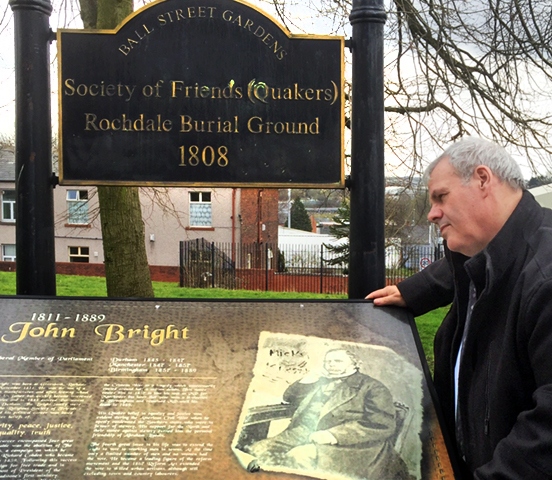 Council Leader Richard Farnell inspects the existing information board at the Quaker Burial Ground