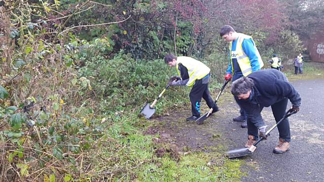 Hopwood students clear walkways and trails, under supervision of tutors and canal officials