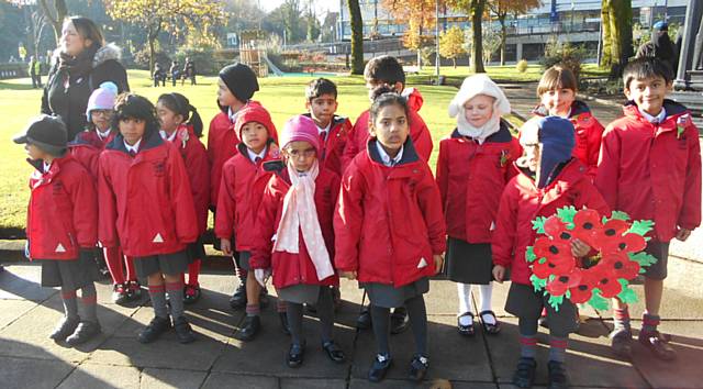 Beech House School Year 1 and Year 2 at the Remembrance Day Service at the War Memorial in Rochdale town centre.