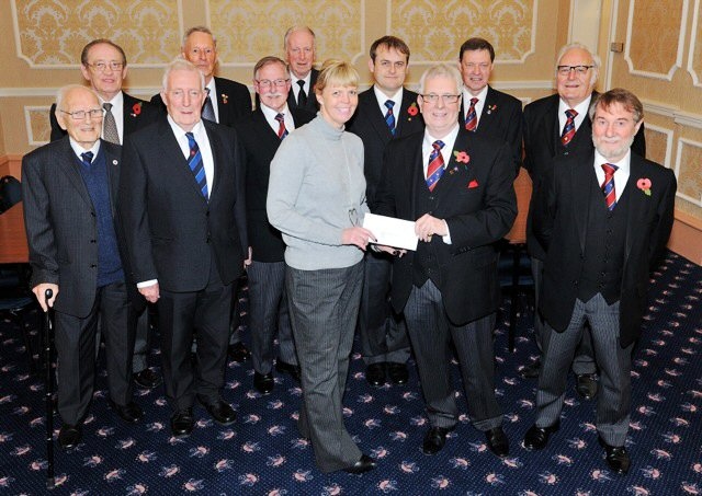 Freemasons hand a cheque to the Moorland Childrens Home