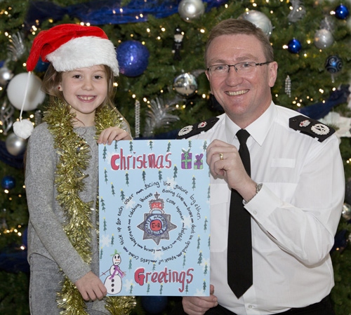 Last year's Christmas Card winner Eve Harrop with Chief Constable Ian Hopkins