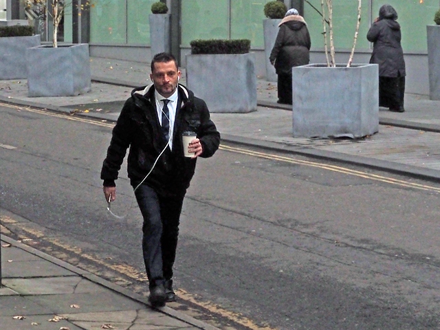 Michael Burke arriving at Manchester Crown Court