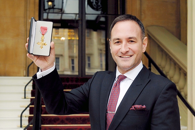 Julian Appleyard with his OBE - a good news story that made it into the top ten