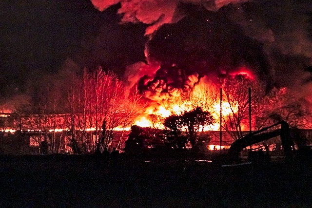 Former Carcraft building on fire