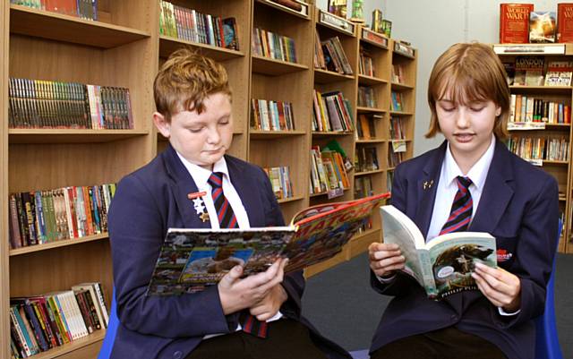 Mackenzie Harnett and Literacy Champion Megan Lucas in the new Reading Room at Whitworth Community High School